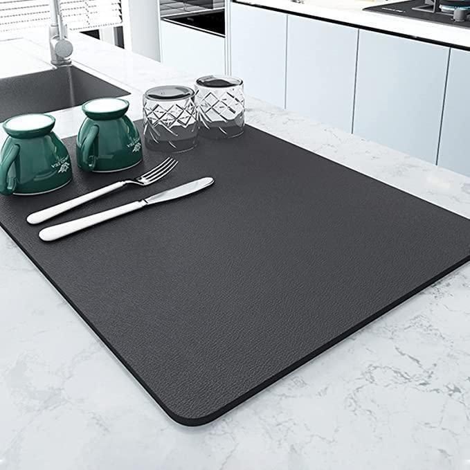 Keep your kitchen countertop clean and dry with this absorbent quick-drying kitchen mat (pack of 2)